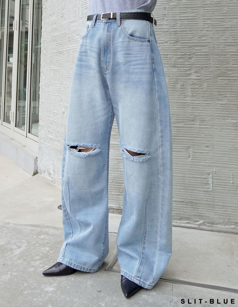 裾フリンジバレルレッグデニムパンツ