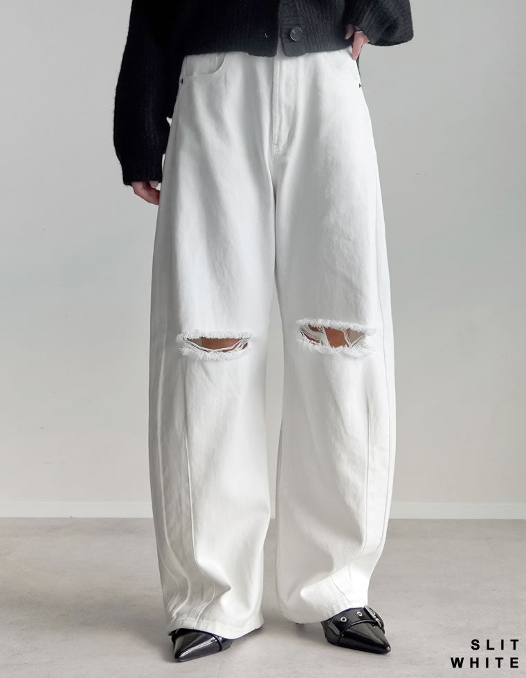 裾フリンジバレルレッグデニムパンツ