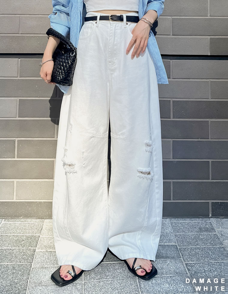 裾フリンジバレルレッグデニムパンツ