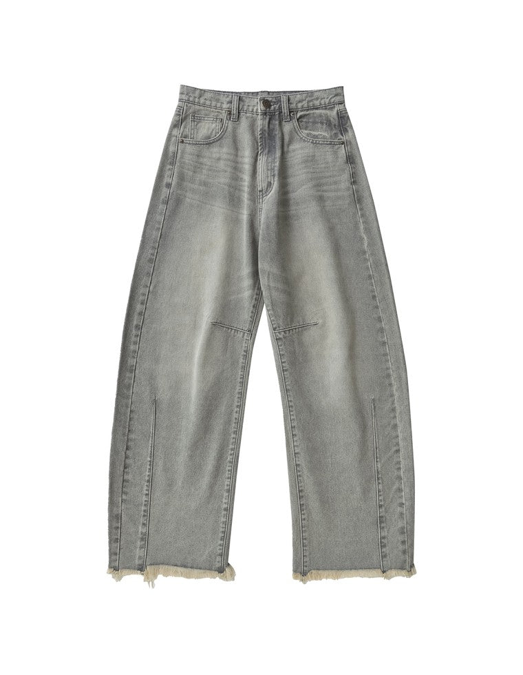 裾フリンジバレルレッグデニムパンツ
