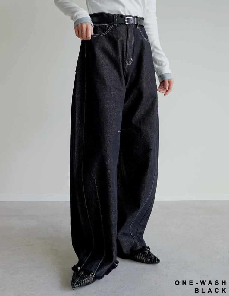 裾フリンジバレルレッグデニムパンツ