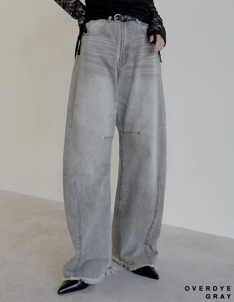 裾フリンジバレルレッグデニムパンツ