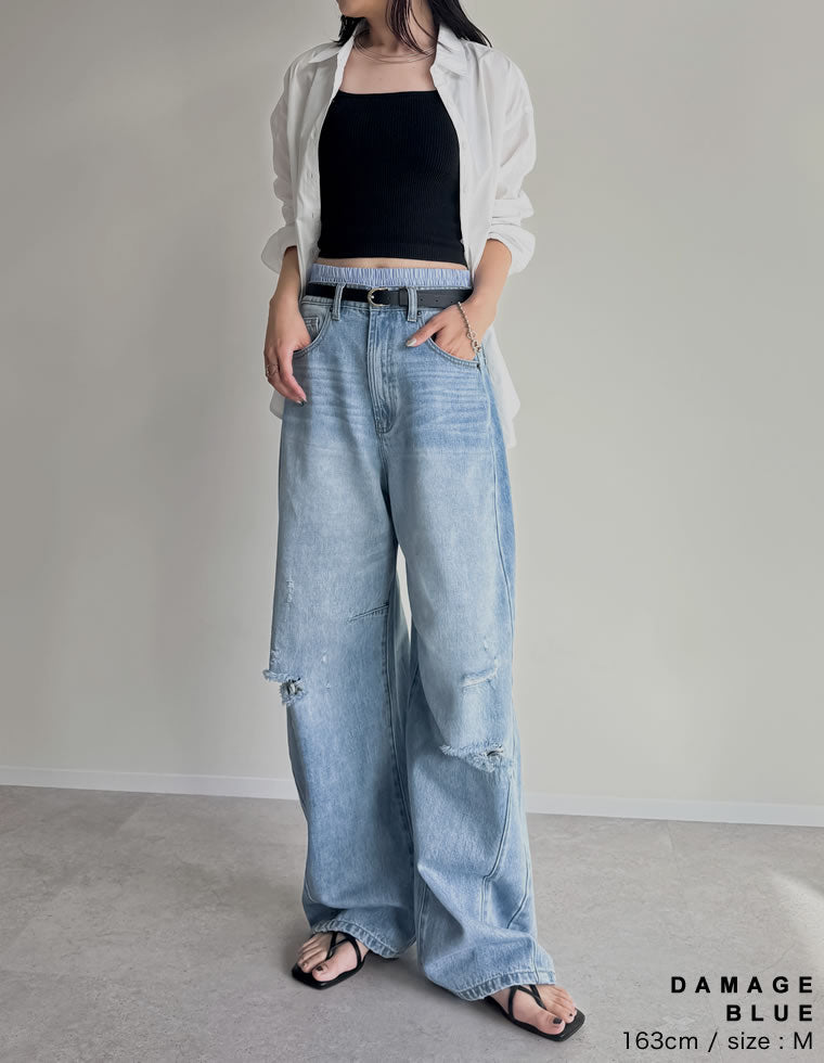 裾フリンジバレルレッグデニムパンツ