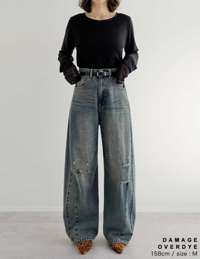 裾フリンジバレルレッグデニムパンツ